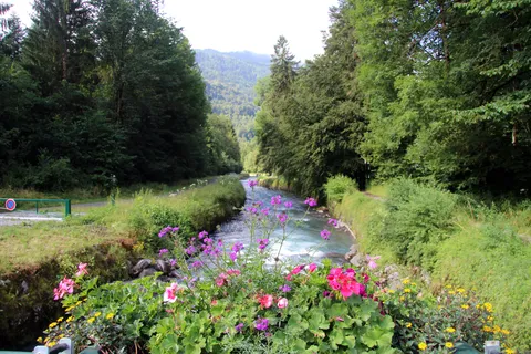 A river and flower-lined banks in Samoëns