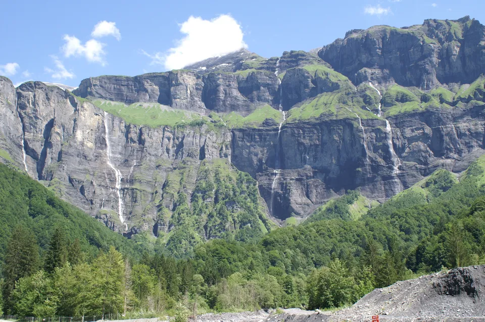 Cliffs and waterfalls in the Cirque du Fer-à-Cheval in summer